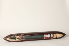 antikes Weberschiffchen aus